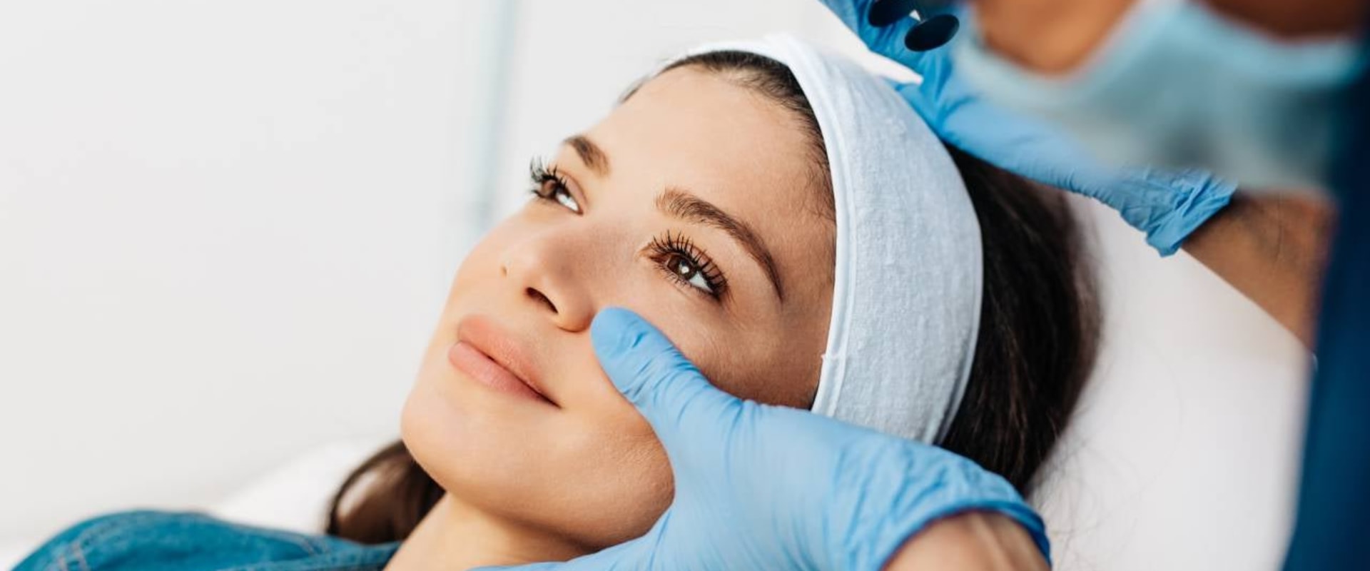 How much debt does a plastic surgeon have?